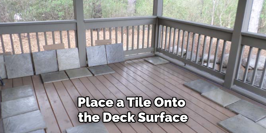 Place a Tile Onto 
the Deck Surface