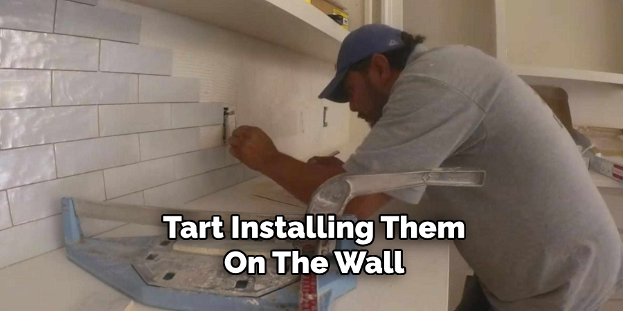 Tart Installing Them
On The Wall