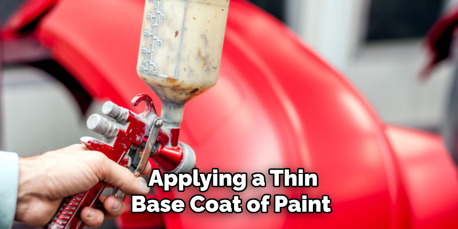 Applying a Thin
Base Coat of Paint