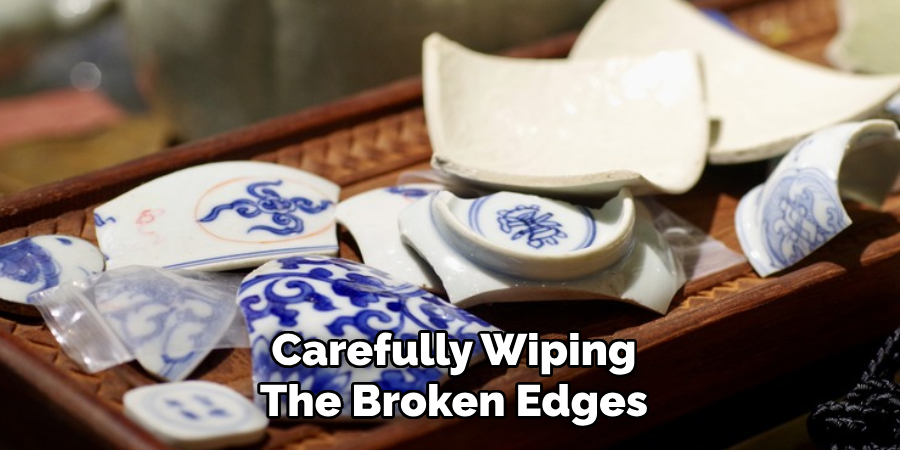 Carefully Wiping
The Broken Edges
