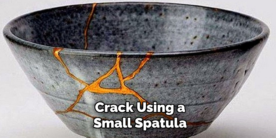 Crack Using a
Small Spatula