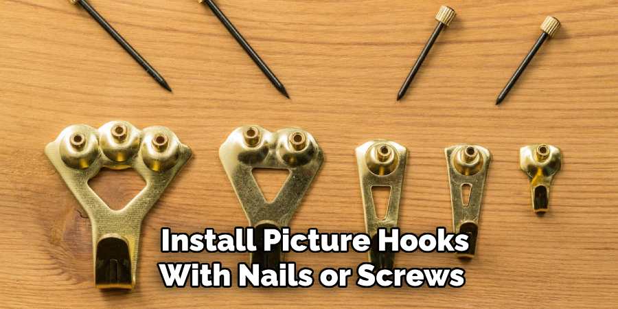 Install Picture Hooks
With Nails or Screws