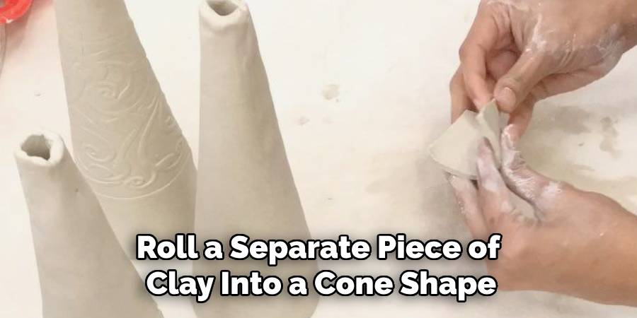 Roll a Separate Piece of
Clay Into a Cone Shape