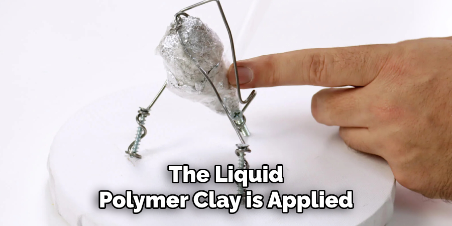 The Liquid
Polymer Clay is Applied