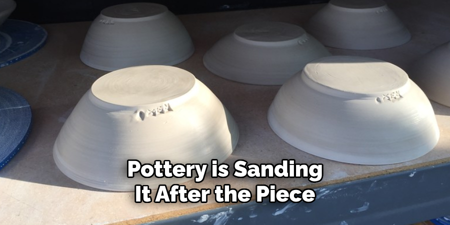 Pottery is Sanding It After the Piece