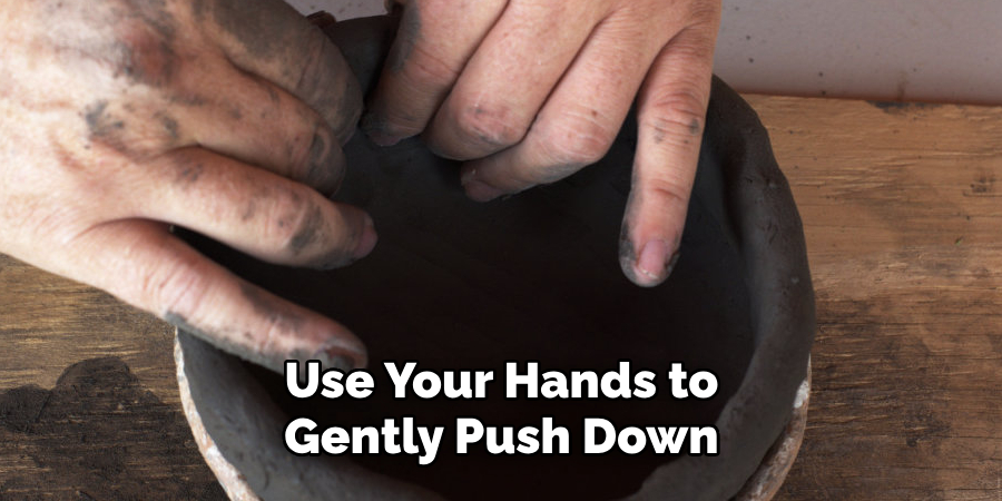 Use Your Hands to Gently Push Down